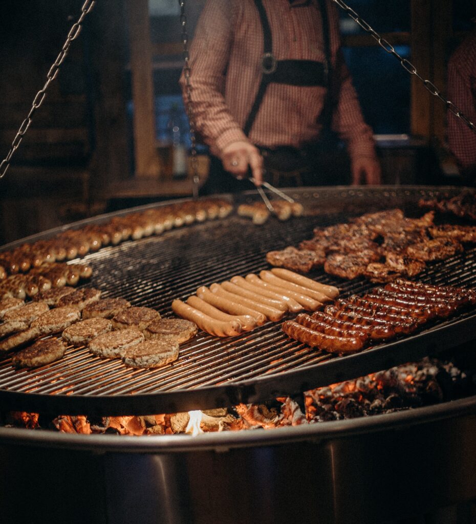 sausages on grill in Germany for things to know about moving to Berlin