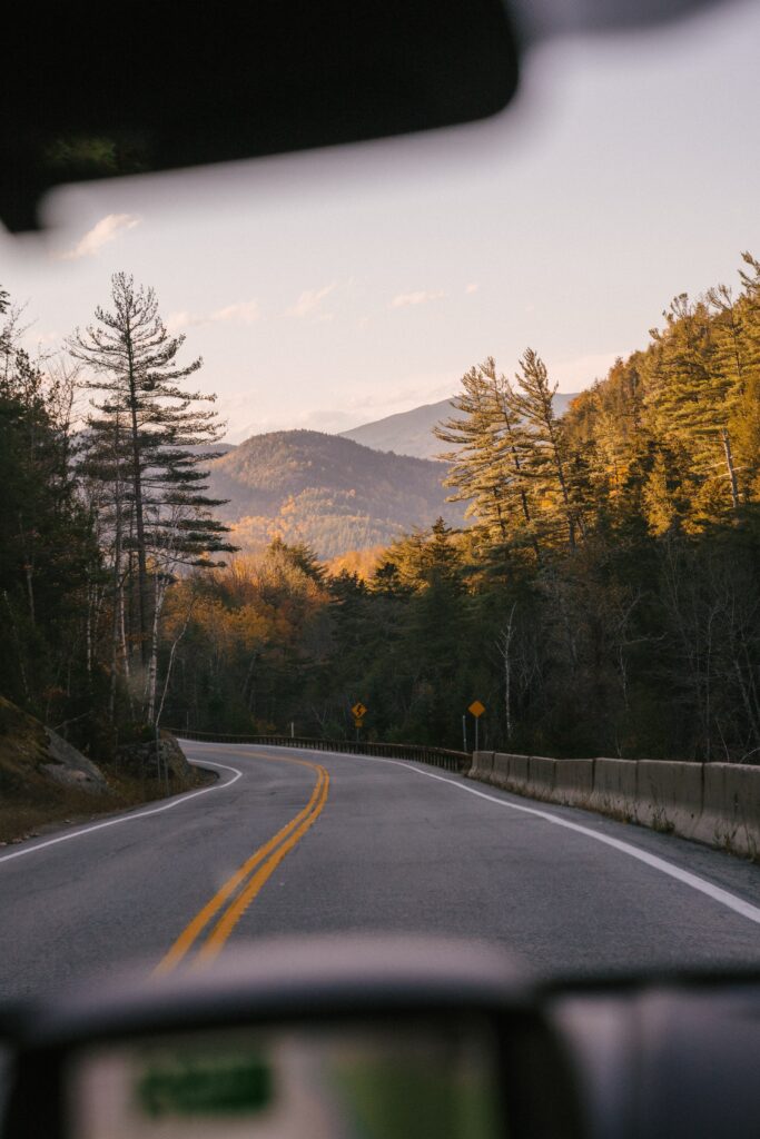 highway road trip destination in view of dashboard