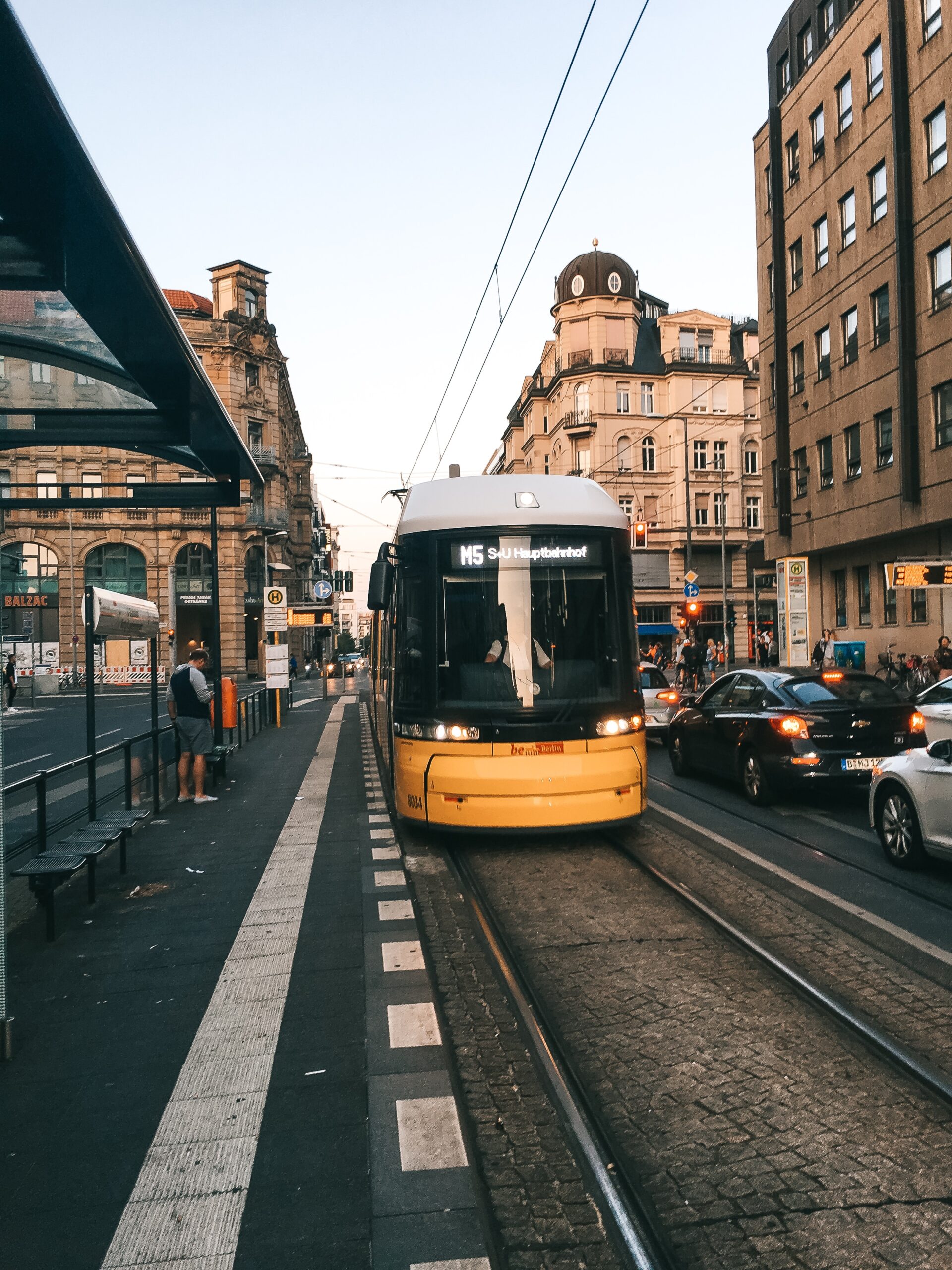 yellow train coming through Germany for transportation things to know before moving to Germany